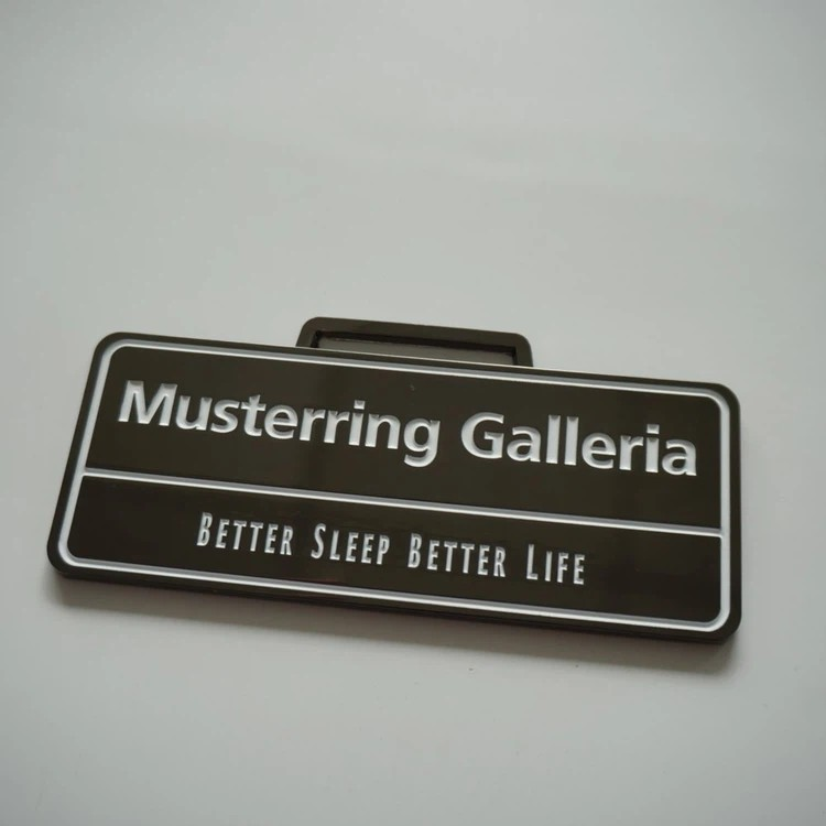 Artwork and finish details prepared for a custom metal nameplate